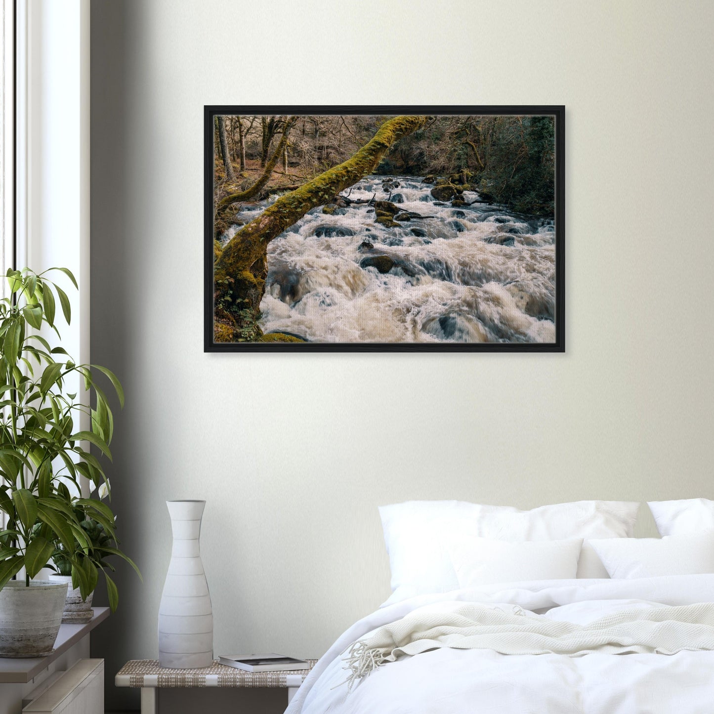 Fast-moving water and forest in Devon framed canvas