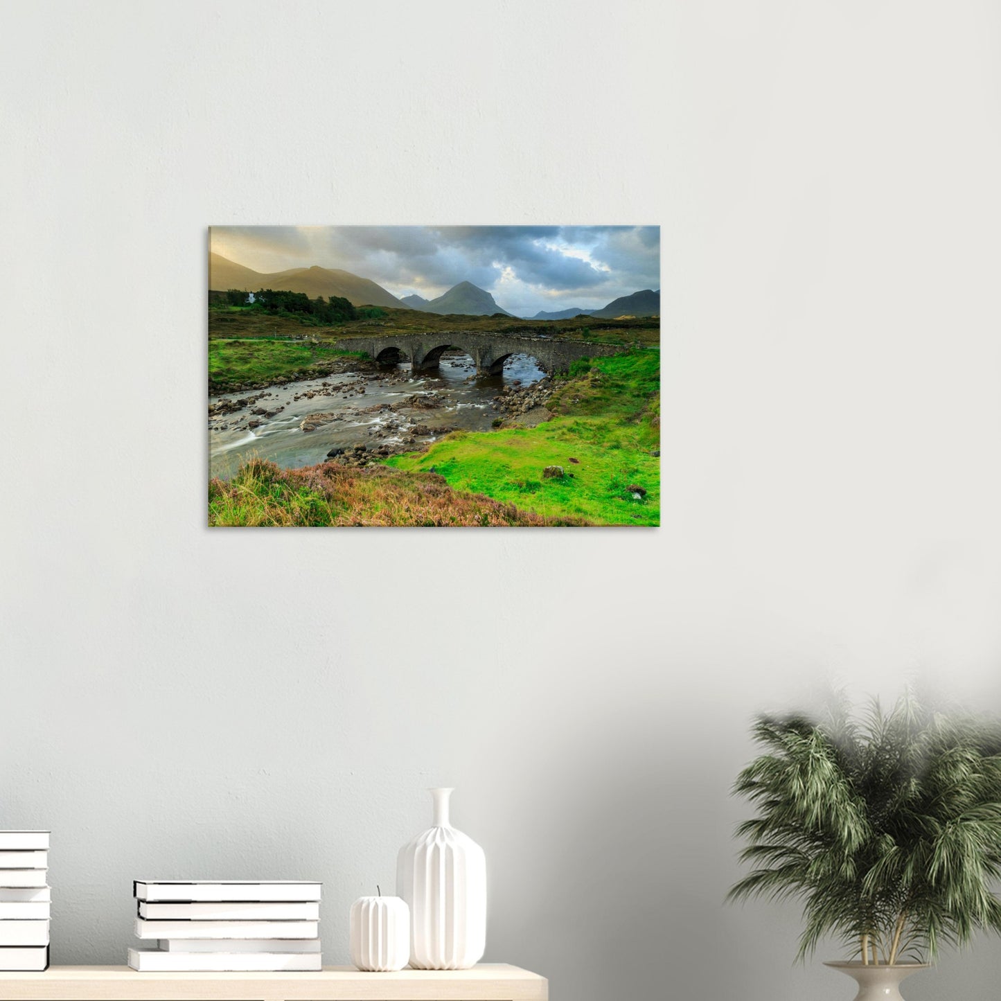 Isle of Skye canvas print of Sligachan’s historic stone bridge under clouded skies with flowing waters below.
