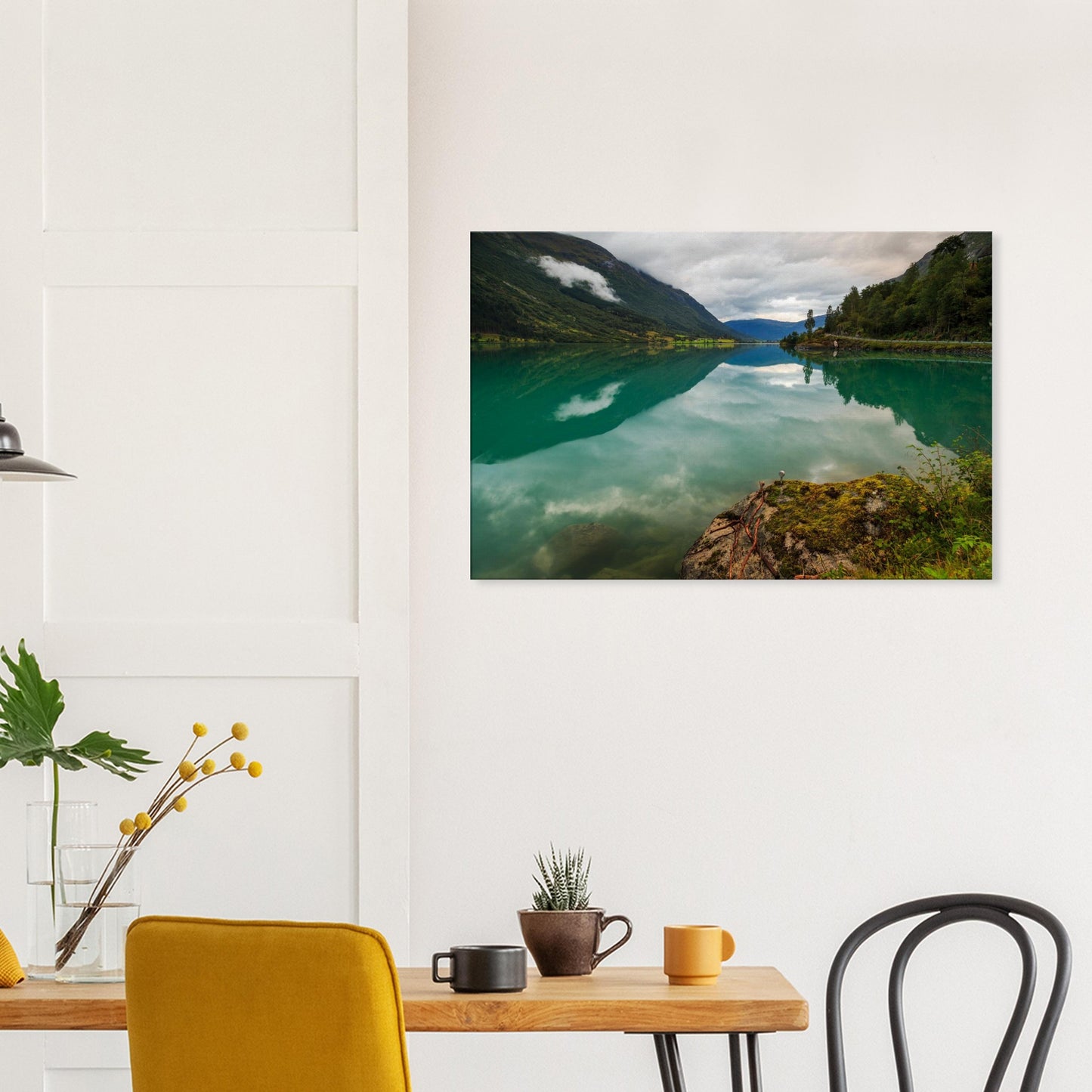 Moody Norwegian landscape canvas with lake and mirrored clouds.