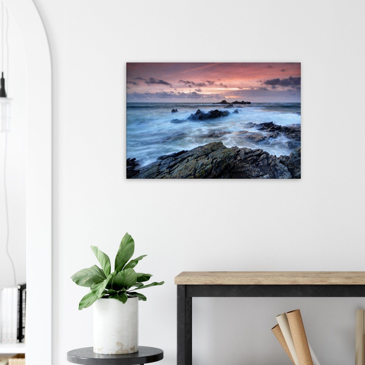 Sunset coastal canvas showing Heybrook Bay’s energetic sea movement and jagged rocks silhouetted against a dramatic red-orange sky.