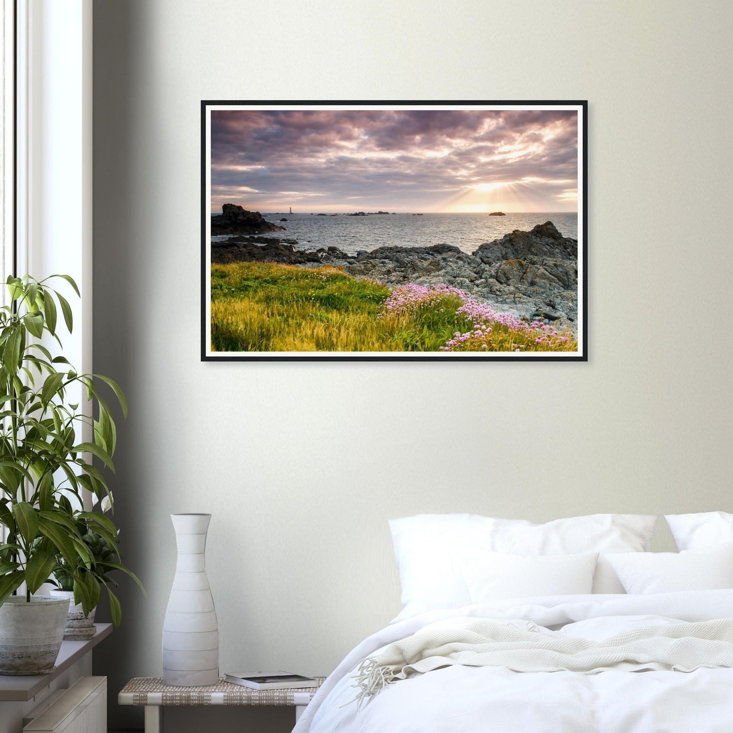 Sun’s rays illuminating Les Hanois Lighthouse framed print