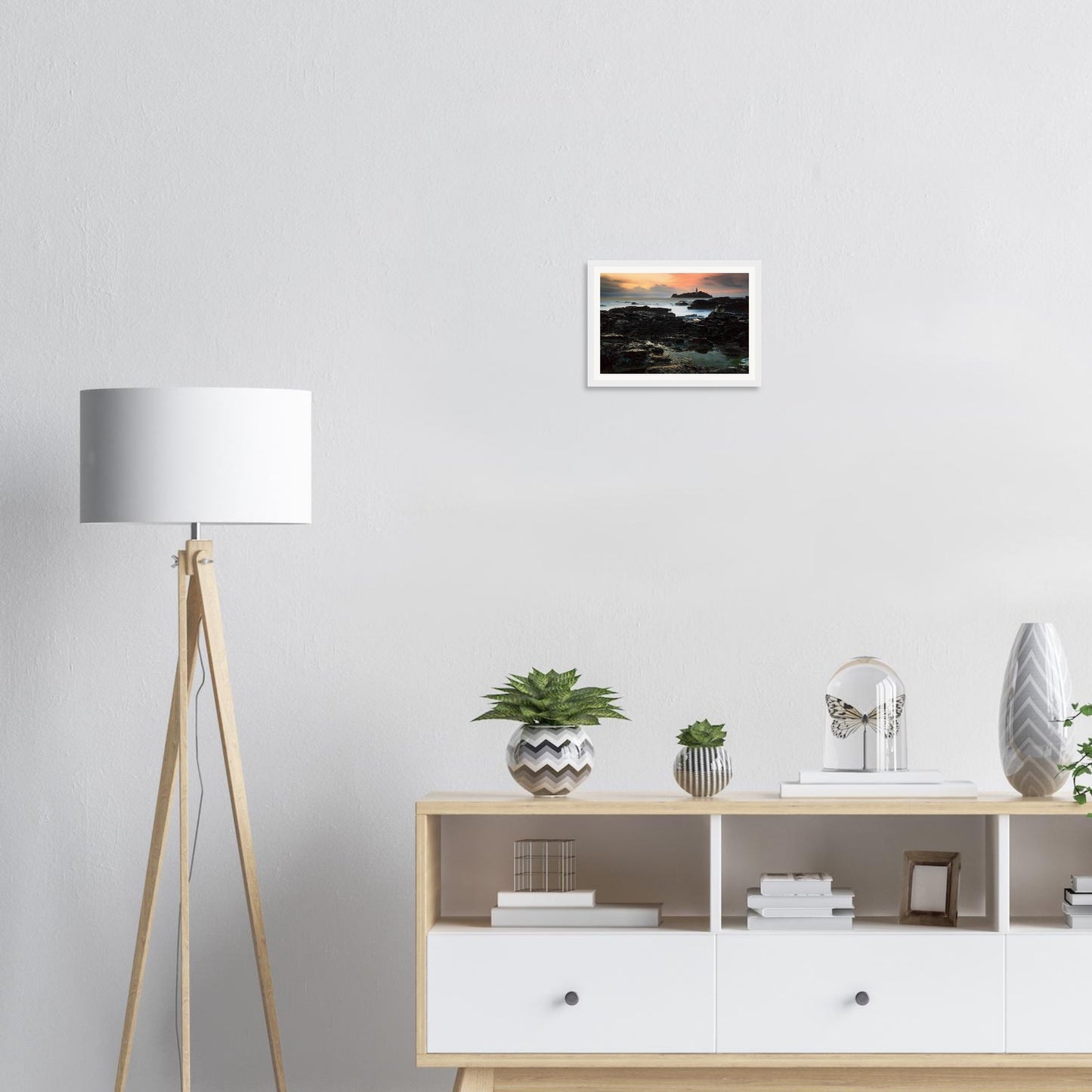 Cornwall’s iconic Godrevy Lighthouse at sunset framed wall art