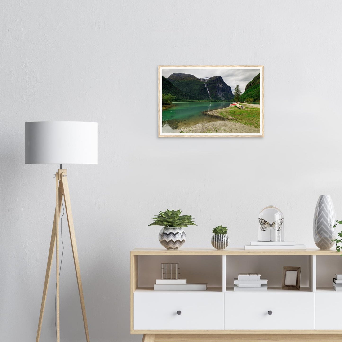 Towering Mount Ramnefjell with cascading waterfall framed print