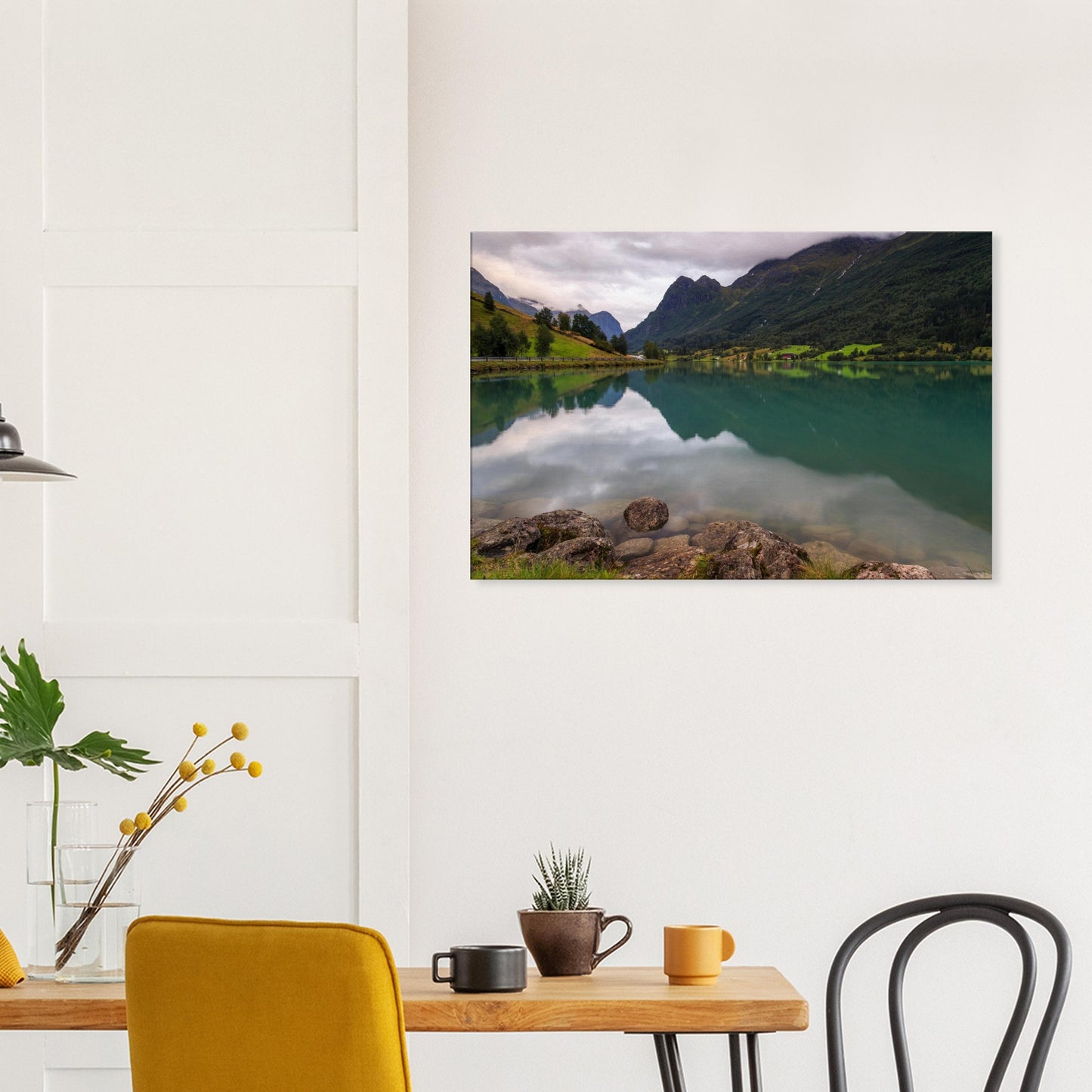 Artistic print showing the untouched beauty of Lake Floen with calm green waters and stoic mountains in the distance.