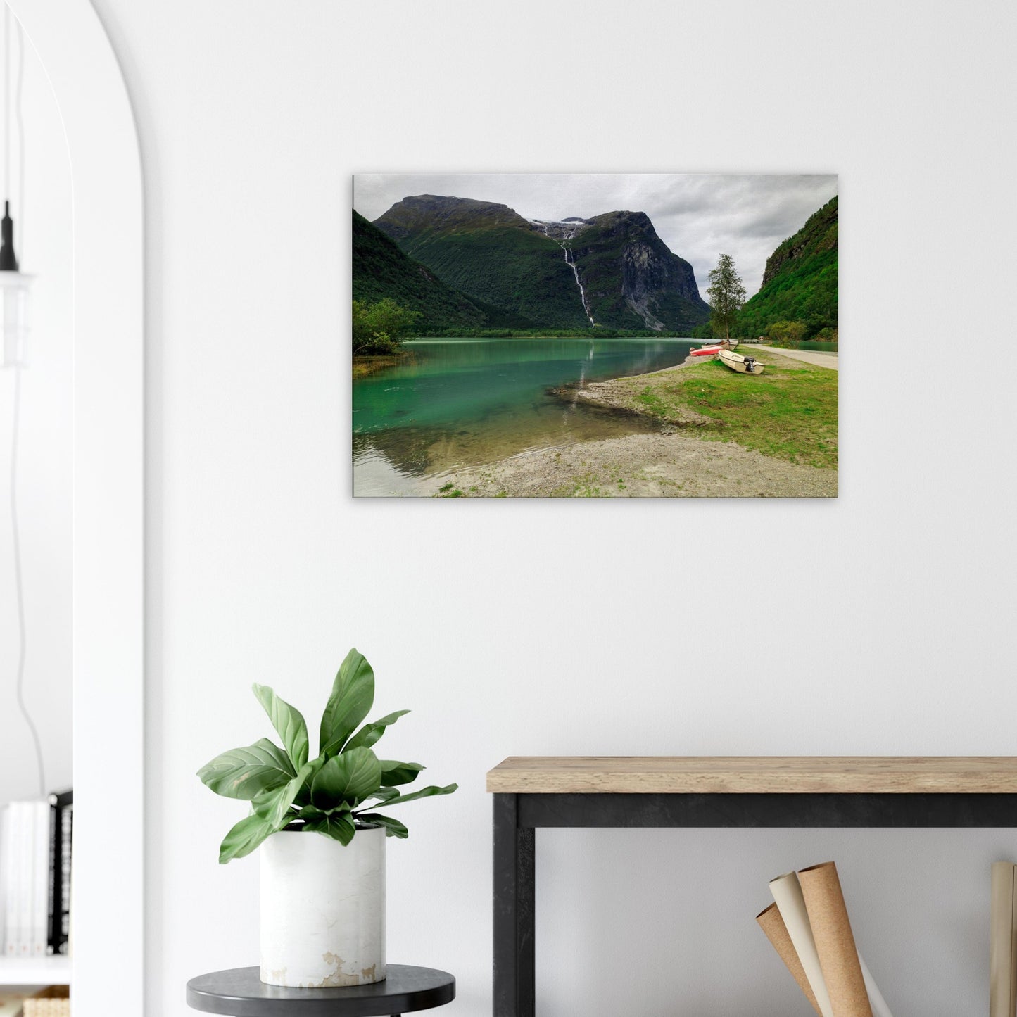 Utigardsfossen Waterfall cascading energetically beside Mount Ramnefjell, framed by lush natural landscape