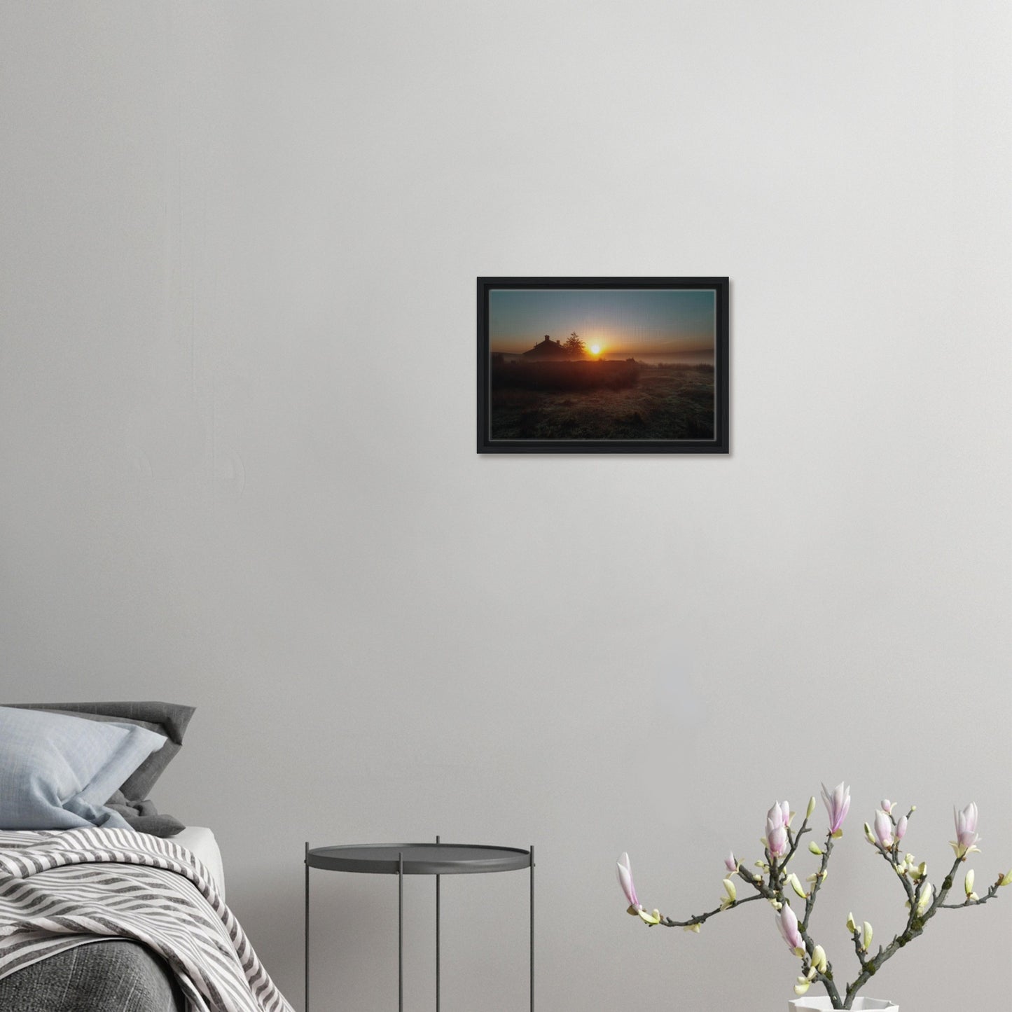 Farmhouse silhouette in sunrise light on the moors