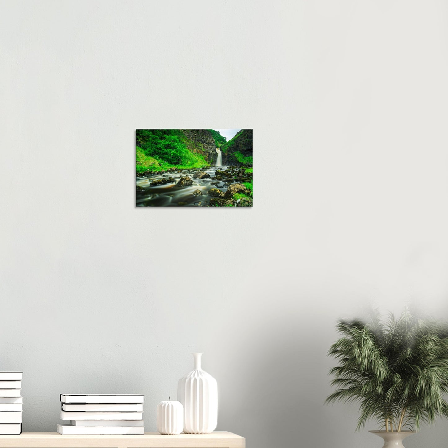Lealt Falls scenic canvas with rushing waterfall softened by long exposure, surrounded by mossy rocks and green plants.