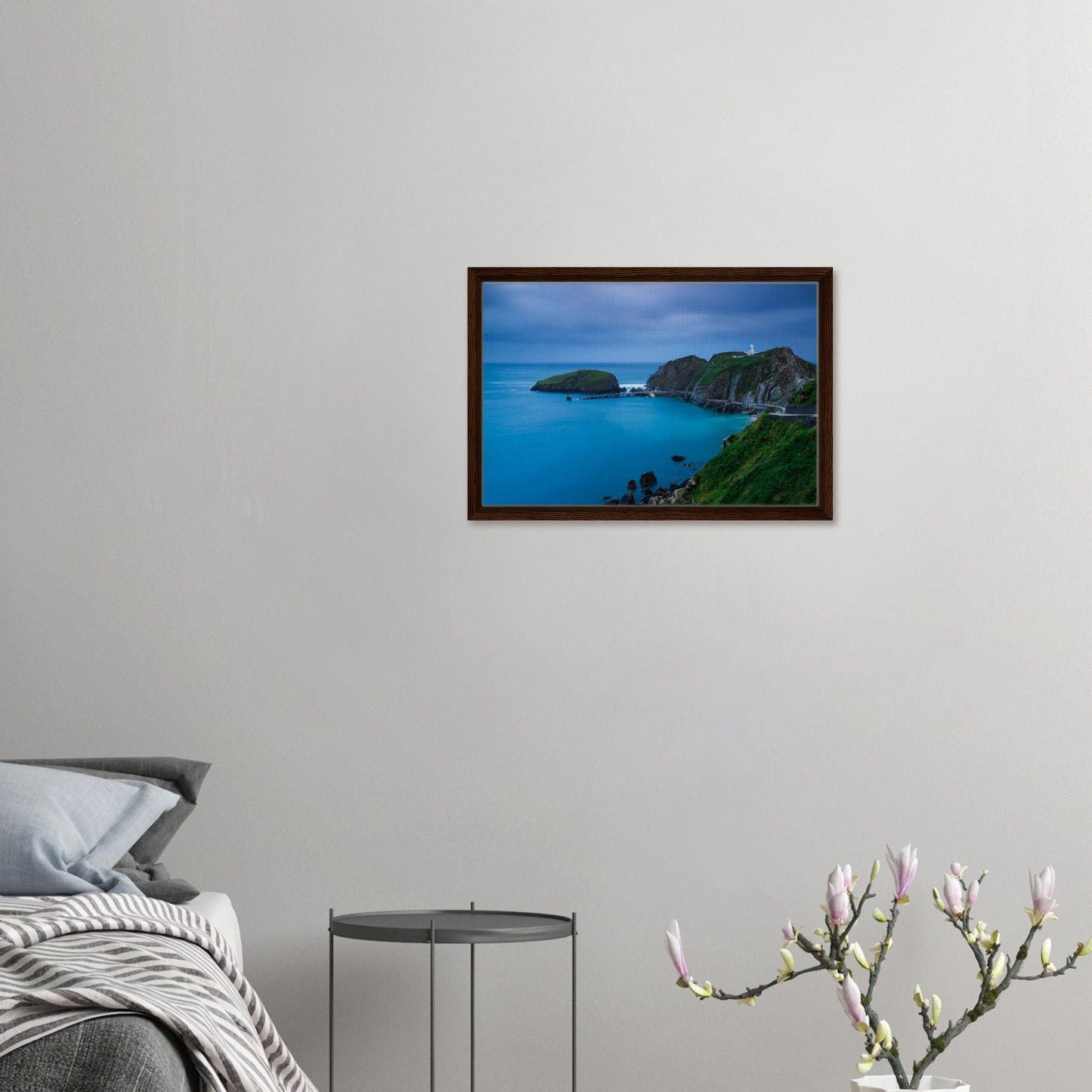 Framed artwork of Lundy Island lighthouse and cliffs at sunset