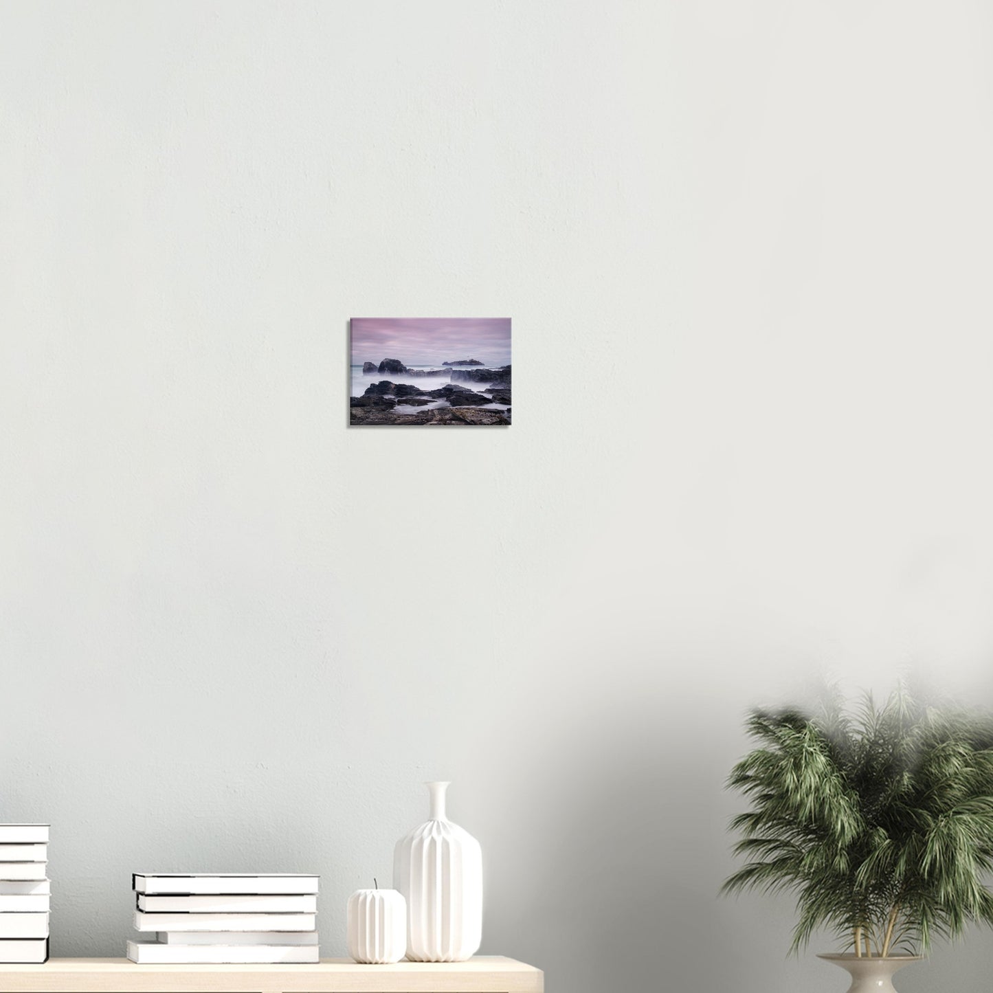Tranquil canvas artwork of Godrevy Lighthouse standing on its island, with mist-shrouded rocks and a soft, peach-toned sky.