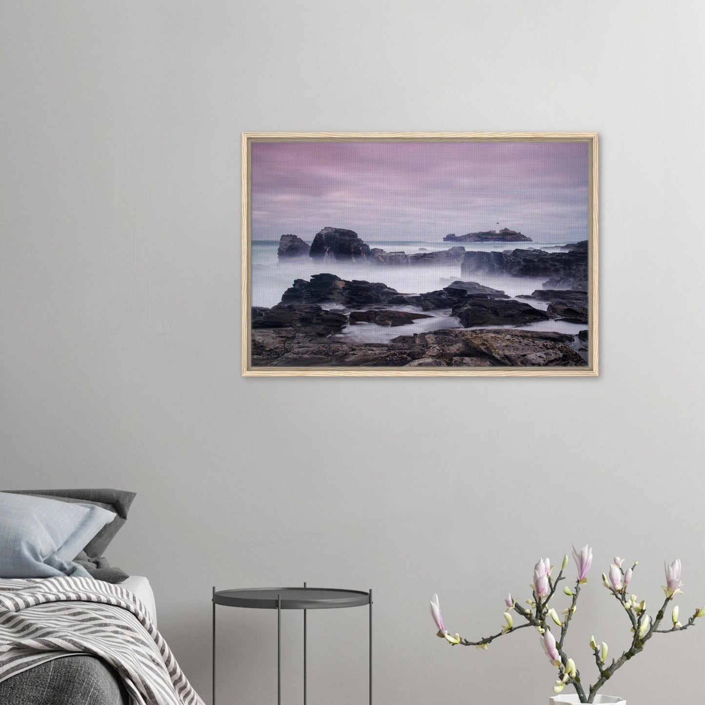 Framed artwork of Godrevy Lighthouse under lavender and peach sky
