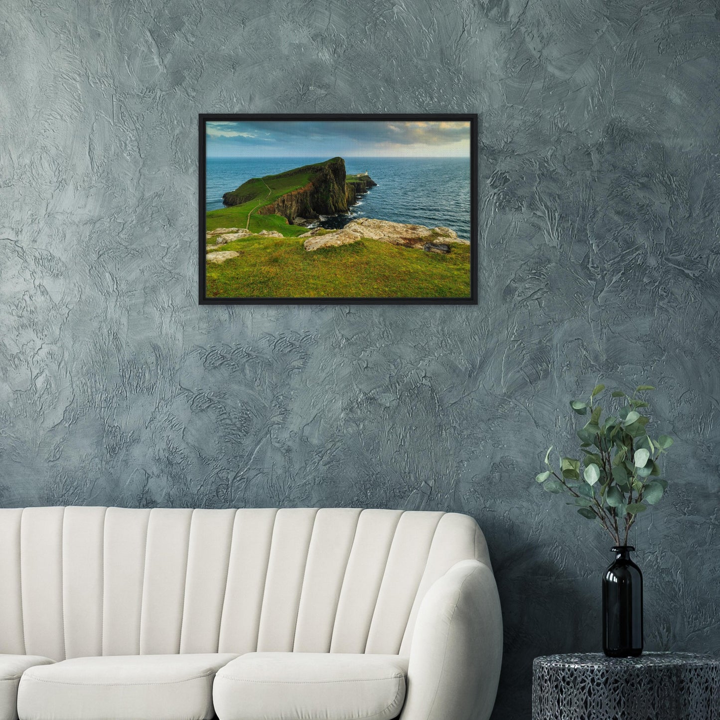 Neist Point lighthouse standing above waves in framed print
