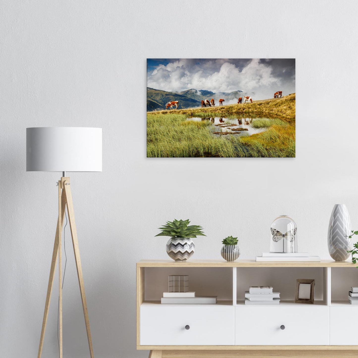 Austrian Alps canvas artwork capturing the charm of grazing cattle, still water reflections, and hazy mountain ridges.