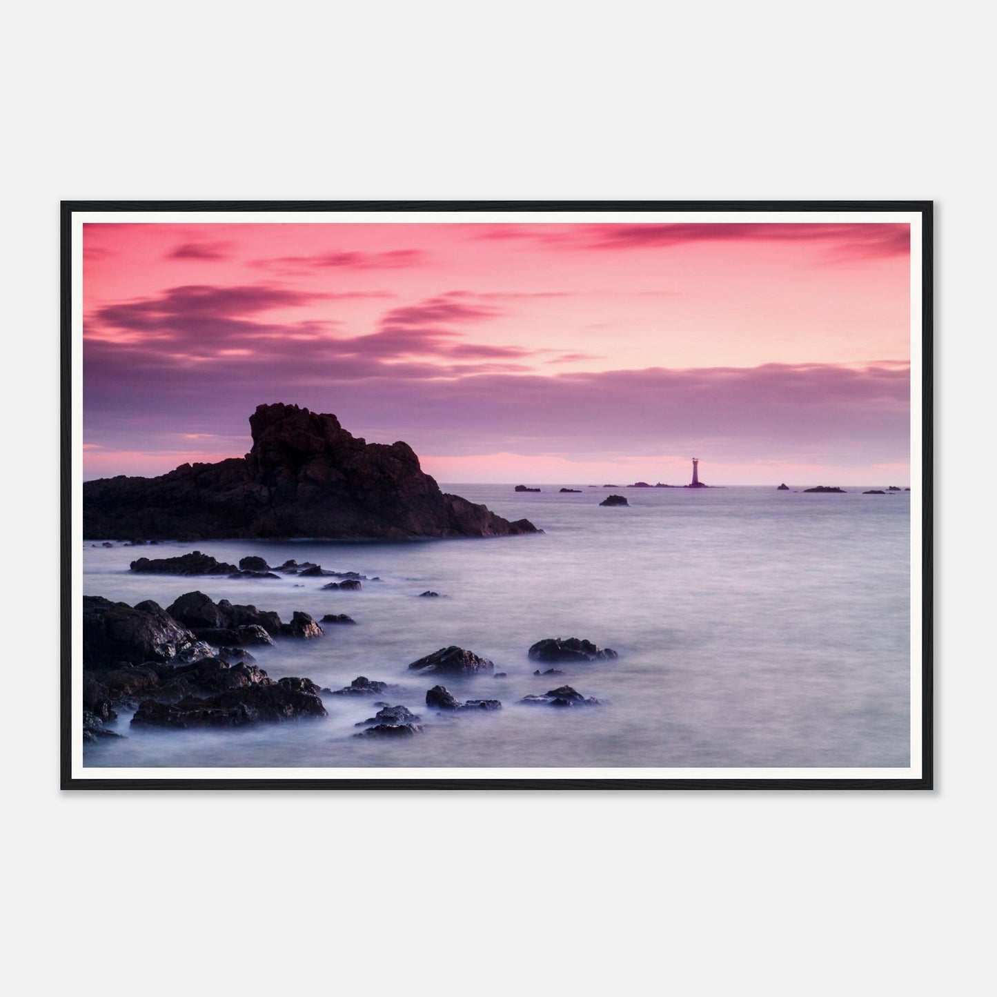 Soft pink and purple sky over Les Hanois Lighthouse framed art