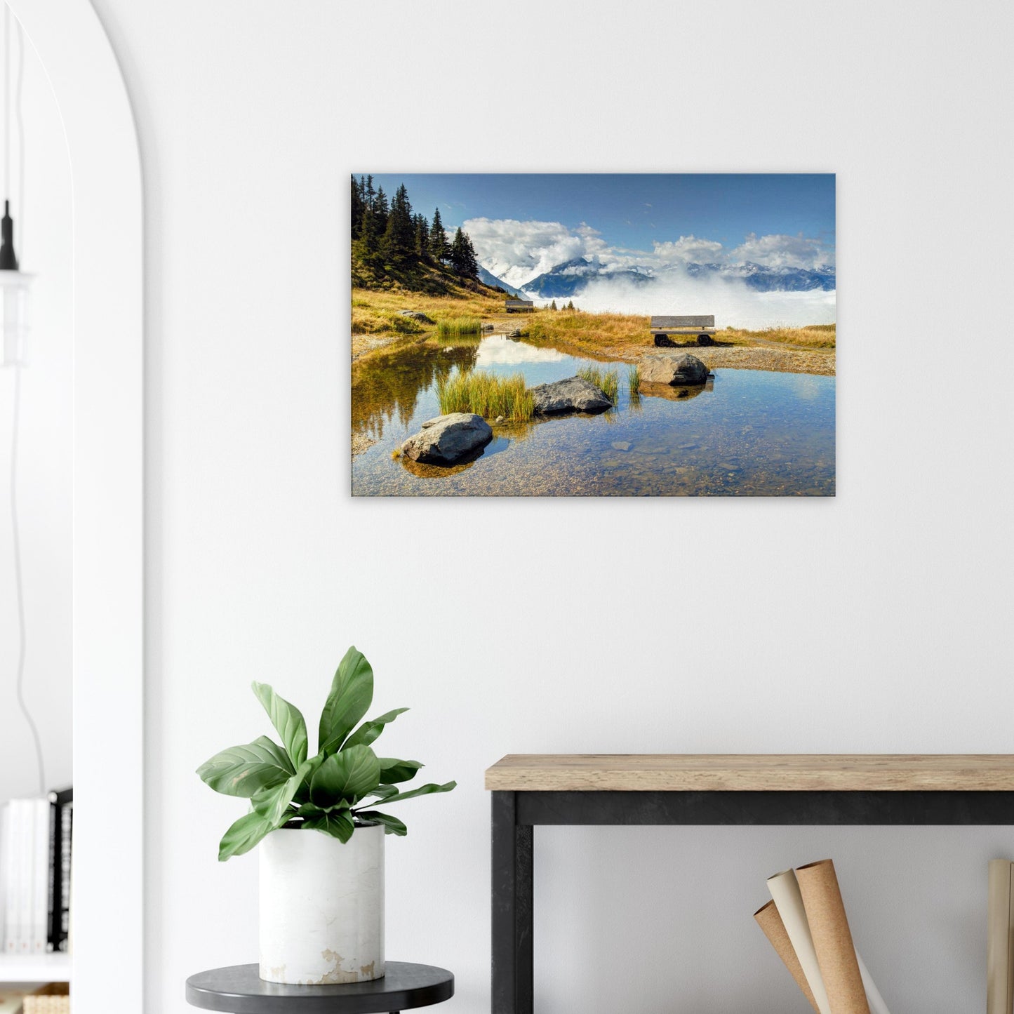 Resterhöhe alpine print featuring a lone bench by a pond with clouds rising through the valley below majestic Austrian mountains.