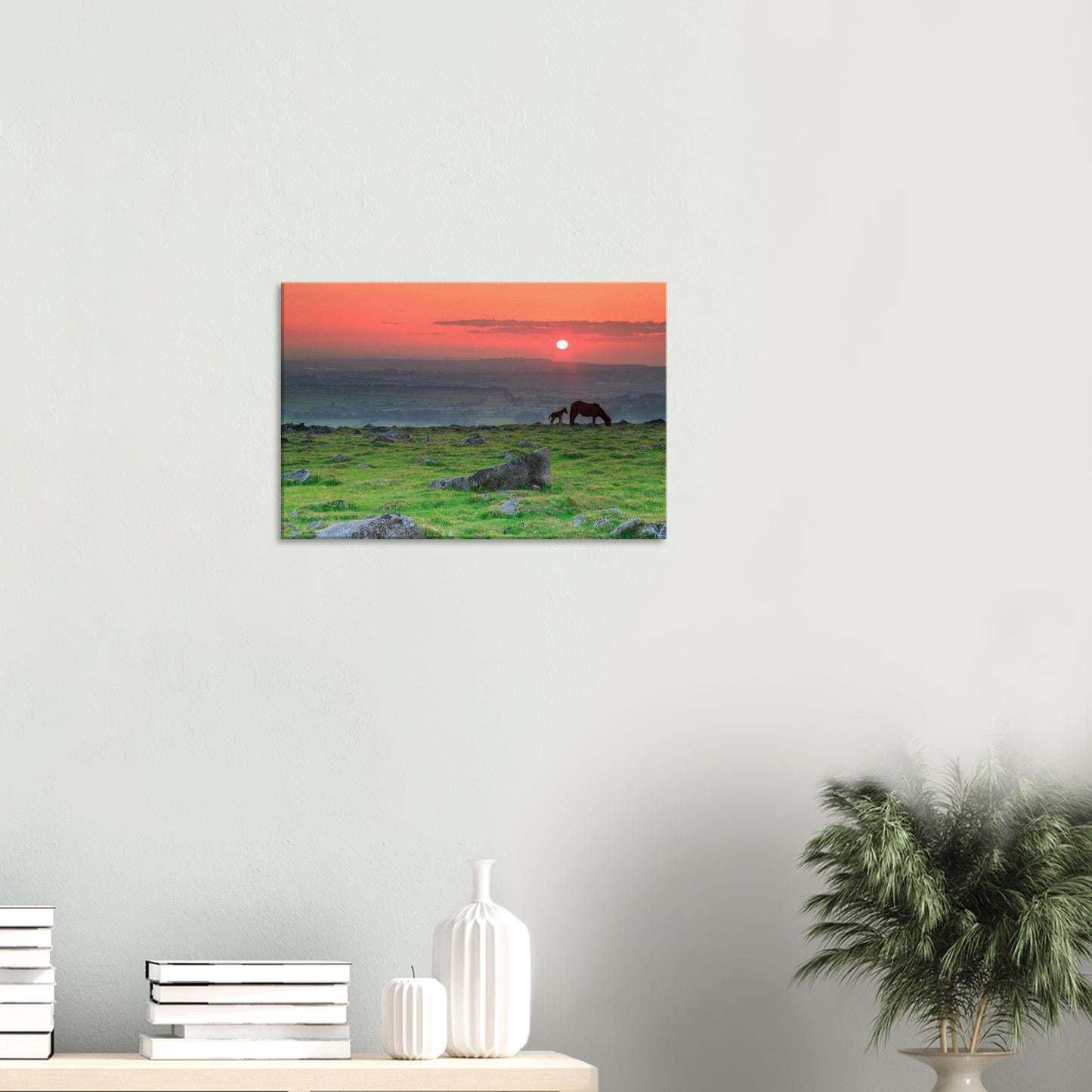 Tranquil Dartmoor scene with mare, foal, and warm twilight sky on canvas.