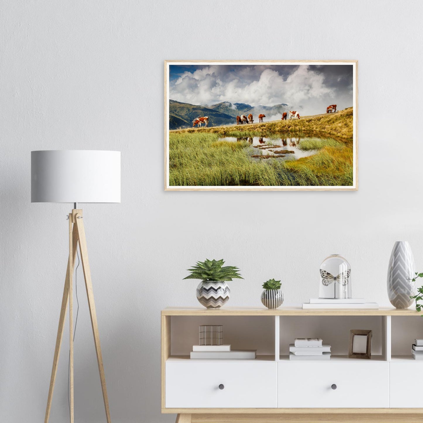 Tranquil alpine pasture scene with cows in Panoramabahn framed print