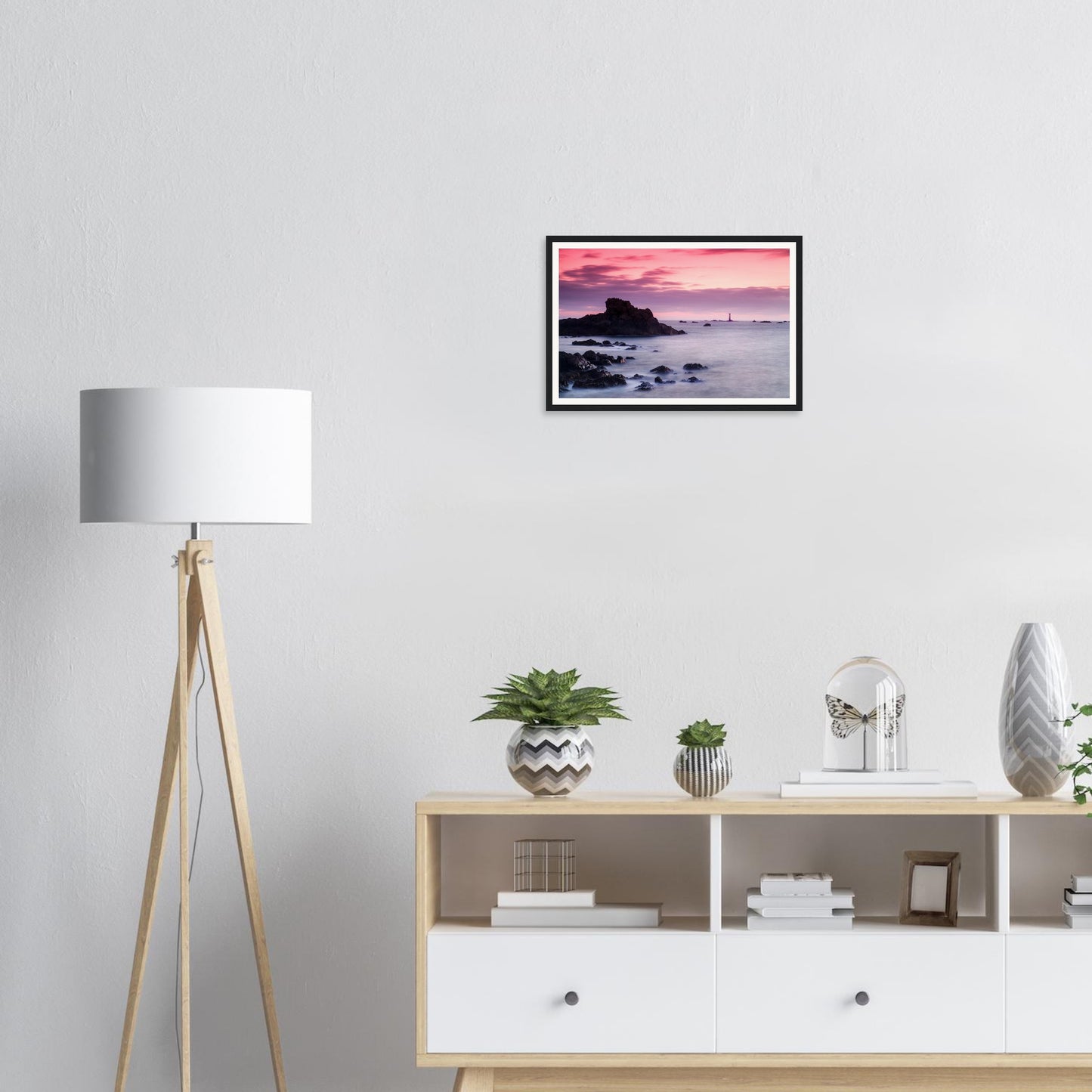 Shoreline rocks with ebbing tide at Les Hanois Lighthouse framed print