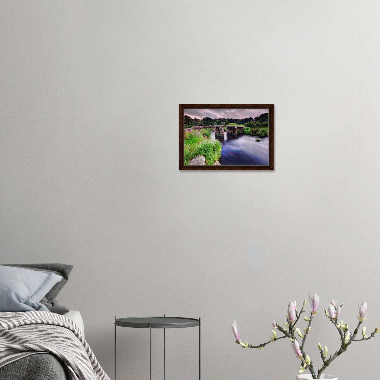 Serene Dartmoor landscape with bridge and breeze-blown flowers