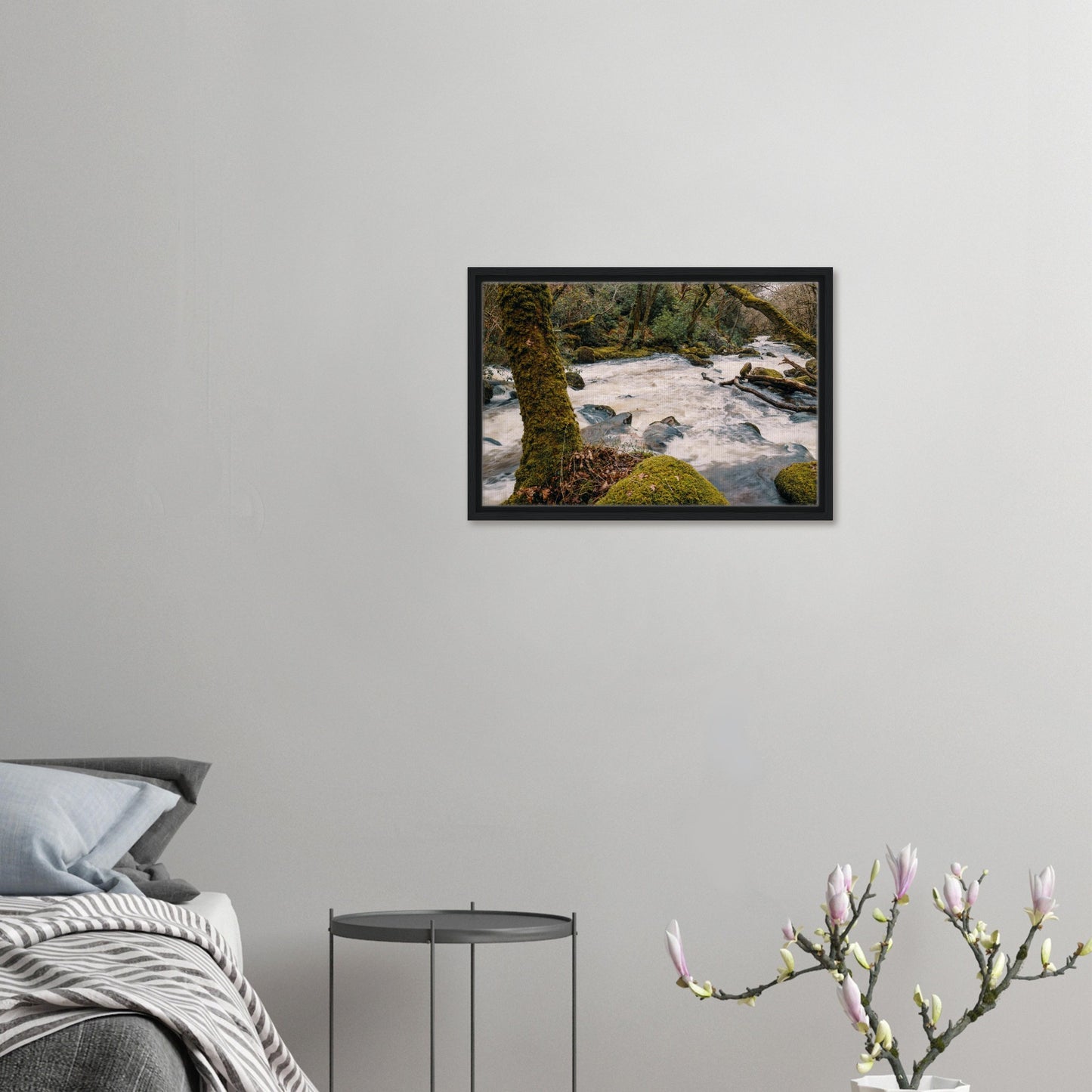 Wild Dartmoor river with vibrant green foliage