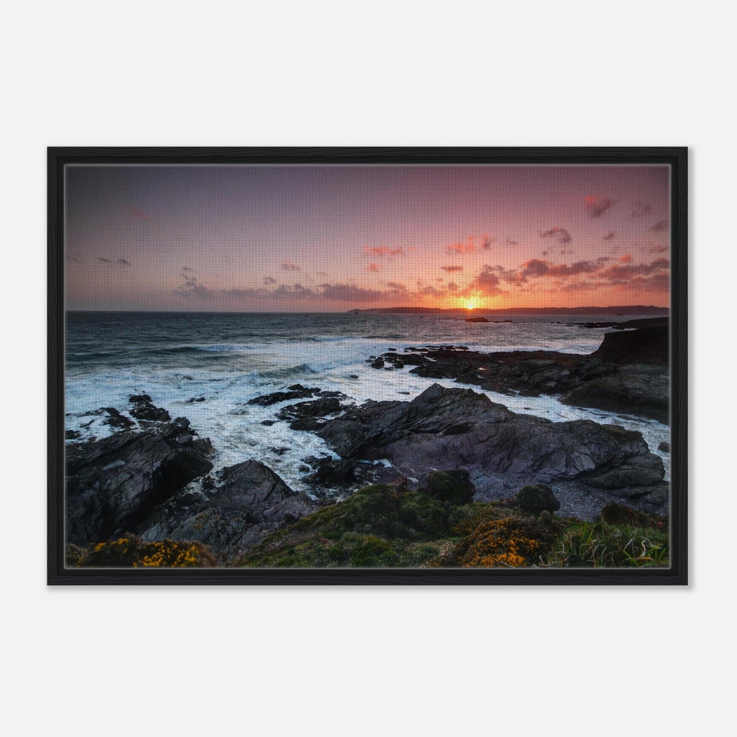 Golden hour light over Heybrook Bay cliffs in framed wall art