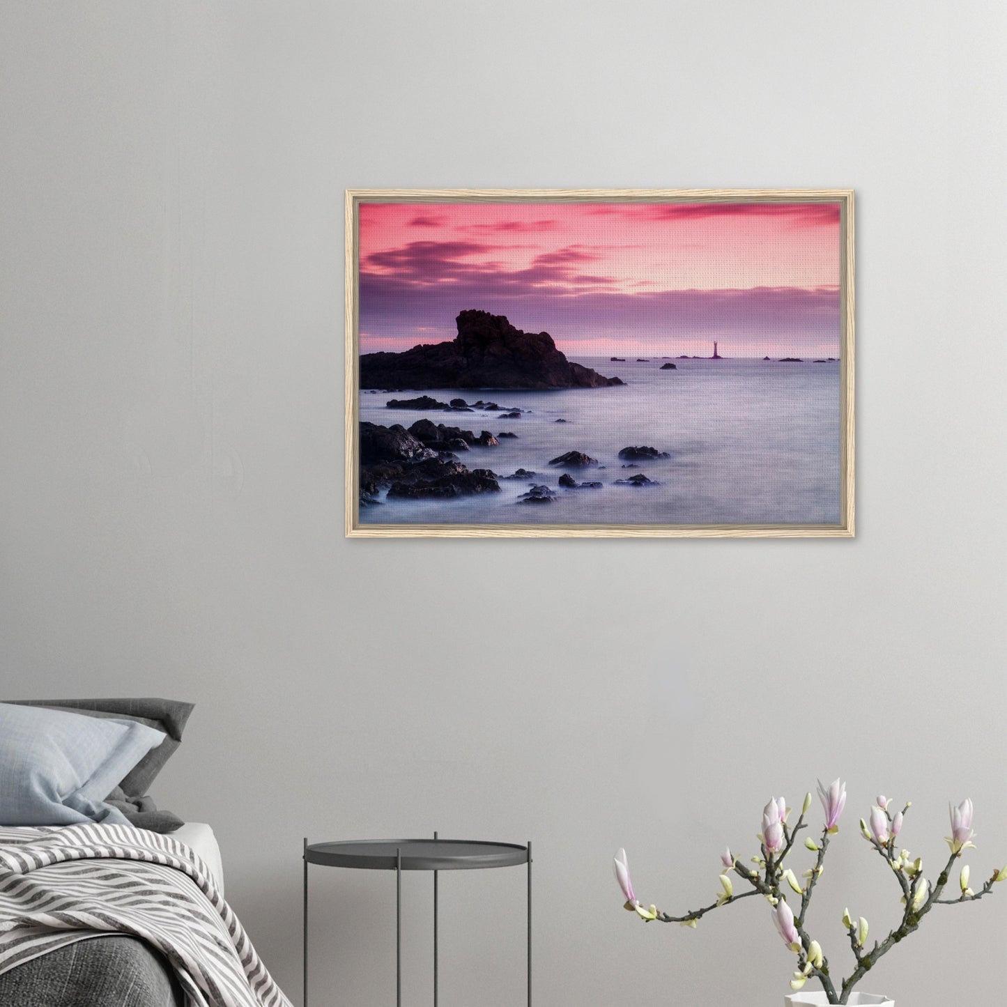 Calm waters and lighthouse silhouette at Guernsey’s coast
