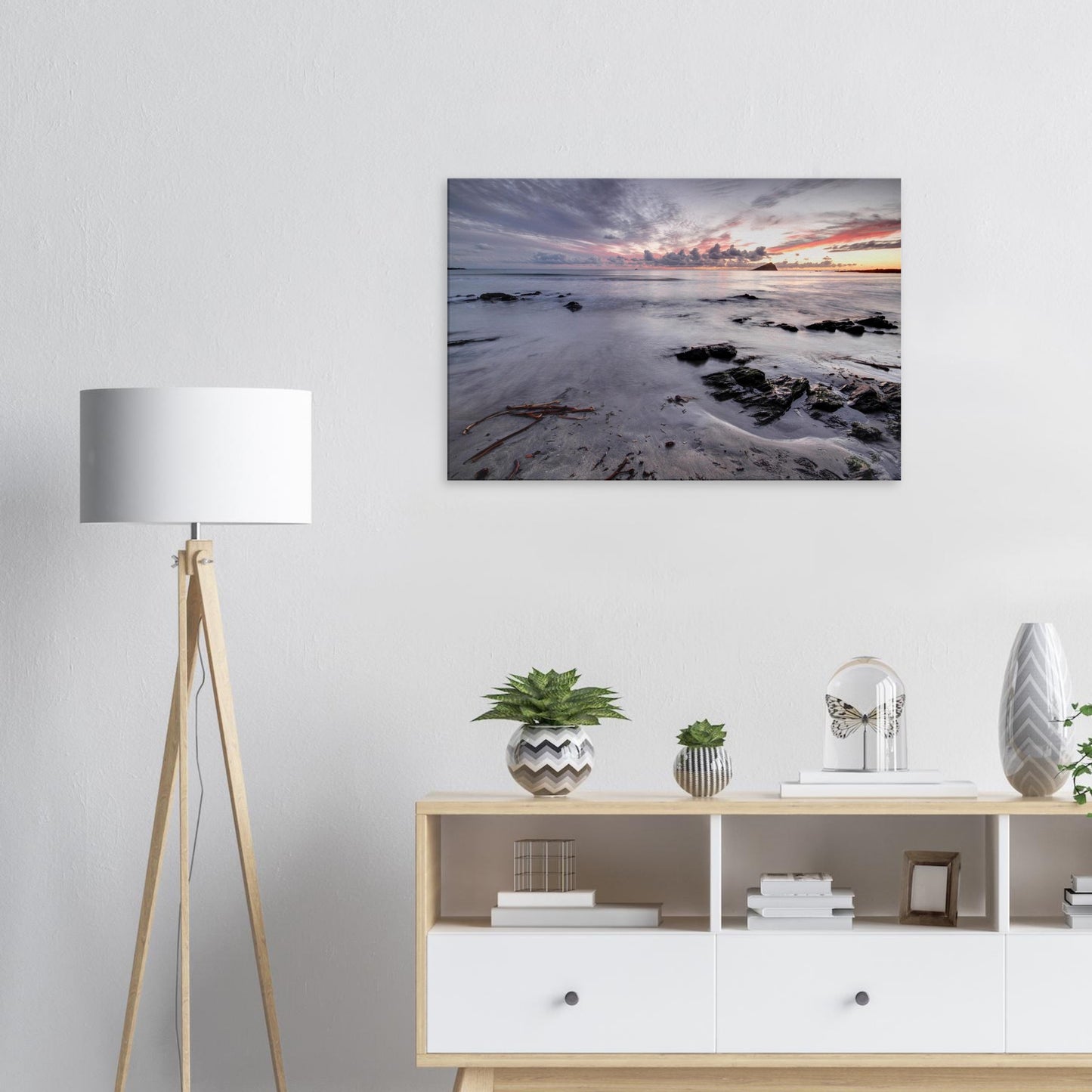 Tranquil Devon beach canvas print capturing Wembury Beach at dusk with gentle tide, driftwood, and Mewstone framed by purple and pink skies.