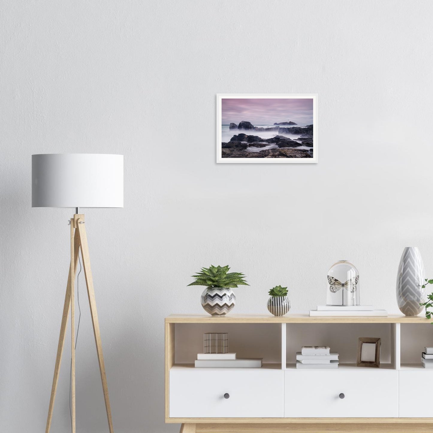 Tranquil framed wall art of Godrevy Lighthouse and rocky shoreline