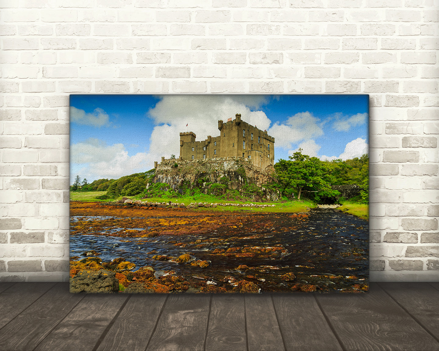 High-resolution photograph of Dunvegan Castle and shoreline Skye