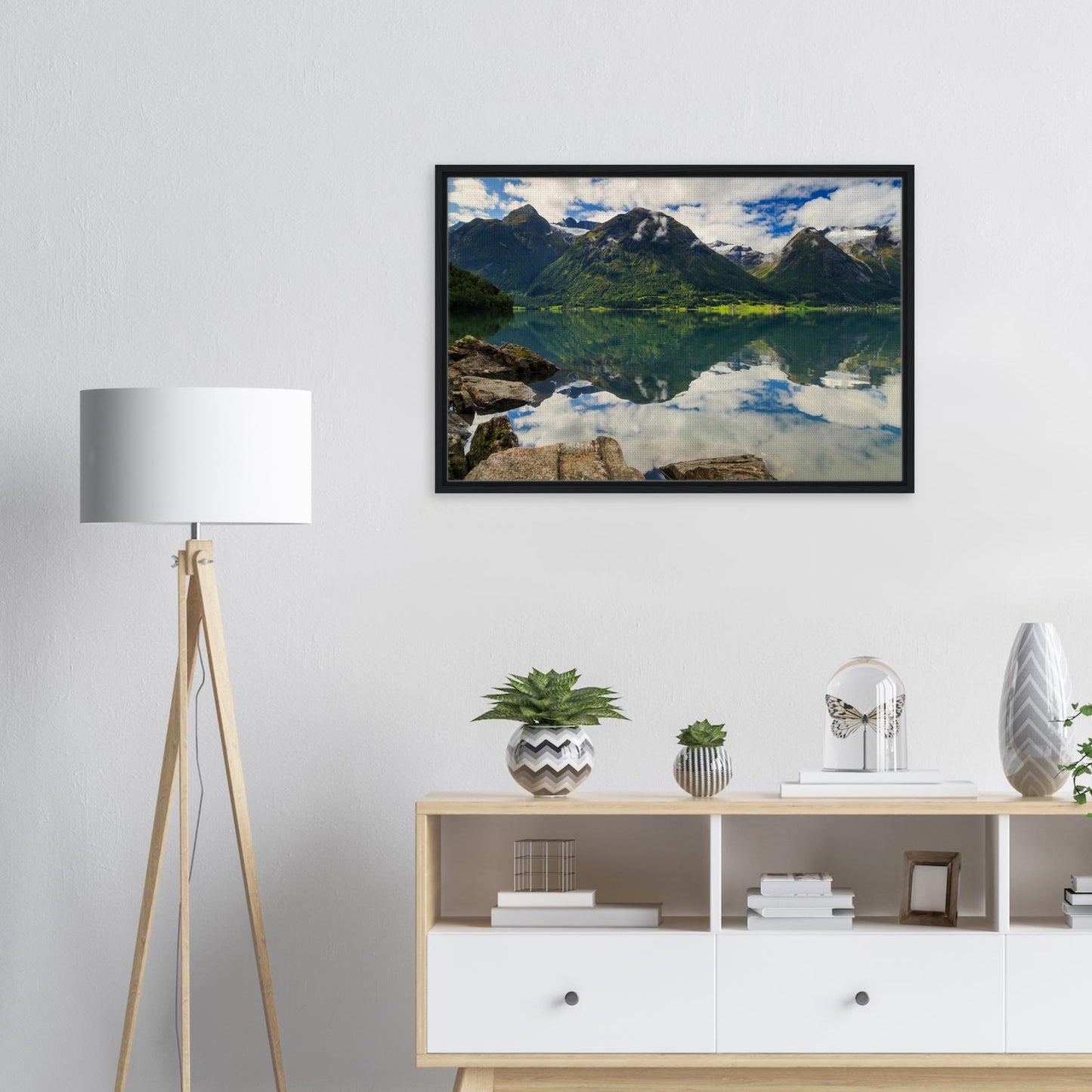 Norwegian nature scene with mountains and cloud reflections