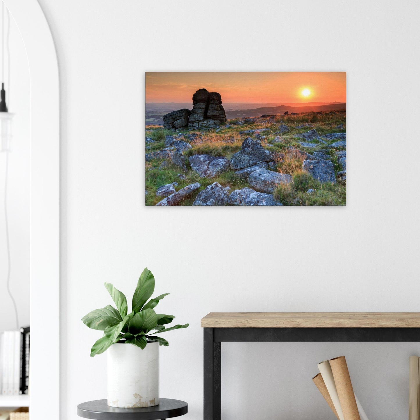 Peaceful Dartmoor sunset scene with glowing sky and timeless granite rock structures