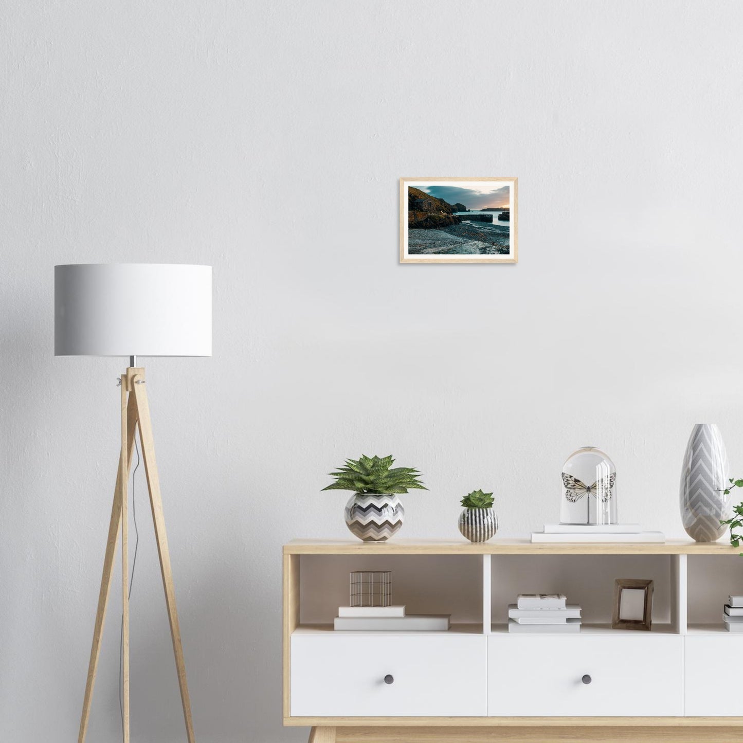 Serene Mullion Cove framed print with stone harbour building