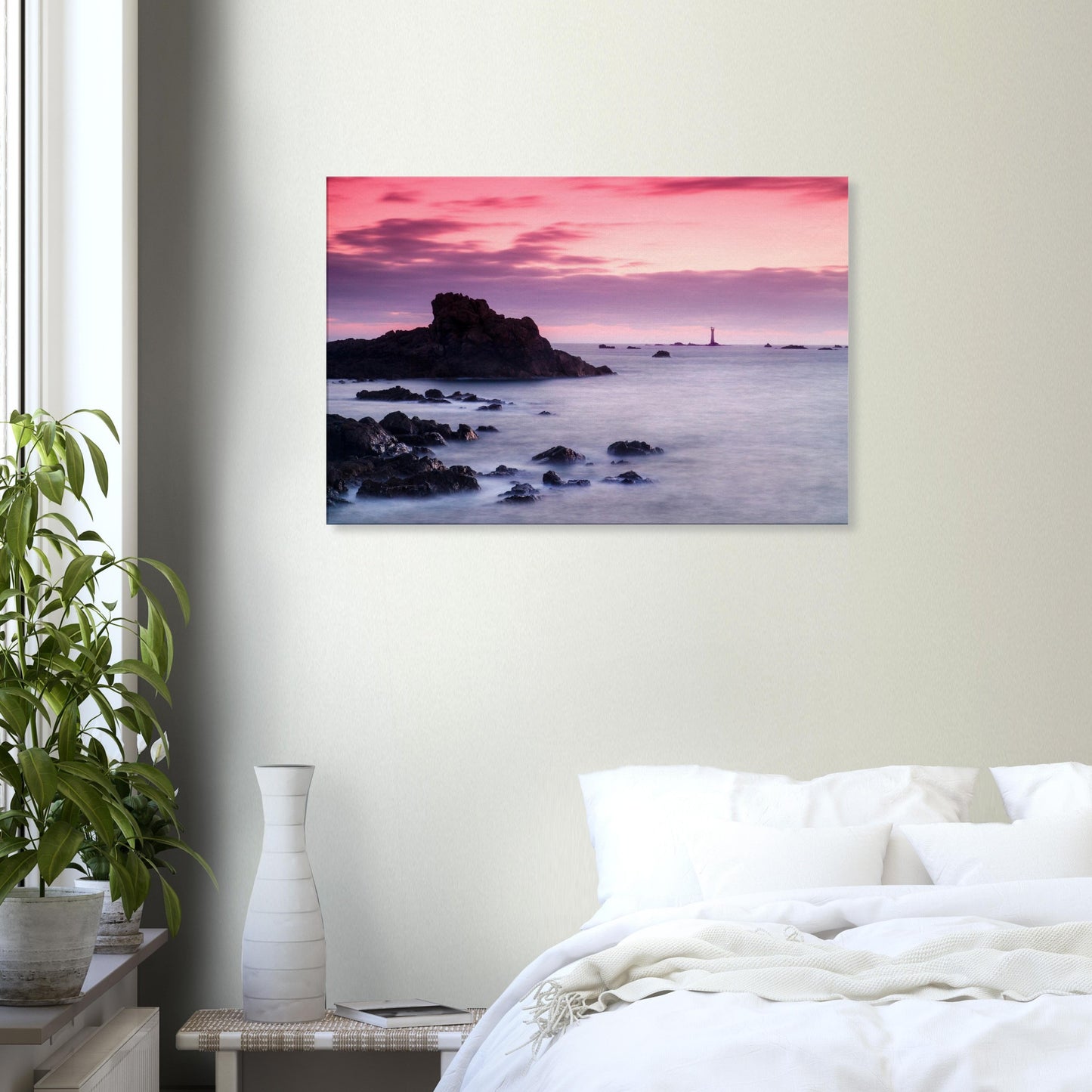 Tranquil sunset canvas from Guernsey, featuring Les Hanois Lighthouse and a peaceful shoreline beneath a glowing sky.