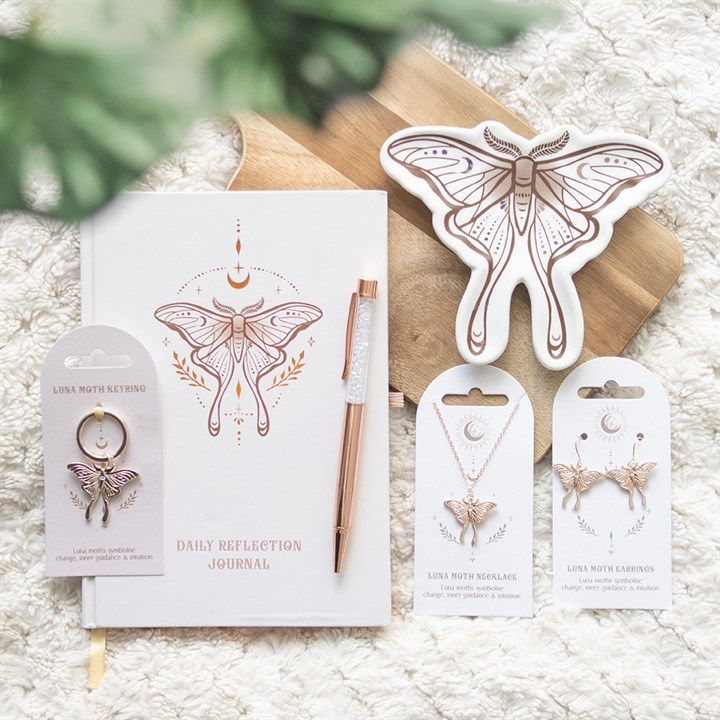 Explore the beauty of the Luna Moth with this collection, featuring a range of enchanting items such as pendant necklaces, tote bags, trinket dishes, and incense holders.