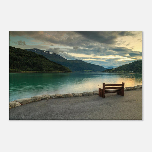 Serene fjord landscape with glassy water reflecting soft pink and purple twilight skies
