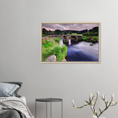 Atmospheric Dartmoor artwork with clapper bridge and stream