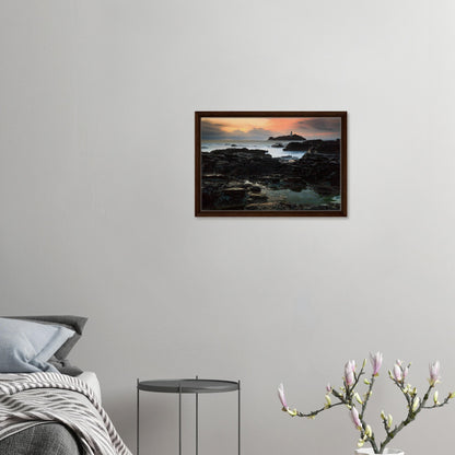 Cornish coastal sunset with lighthouse in framed canvas print