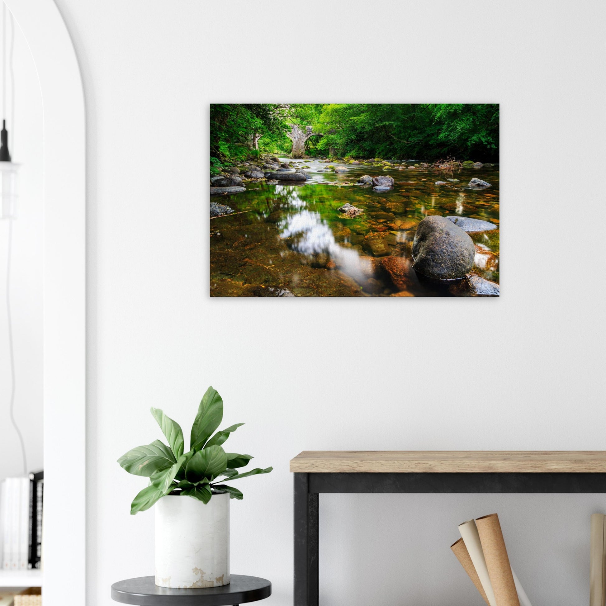 Calm river and natural foliage create a soothing landscape framed by Newbridge’s historic stonework