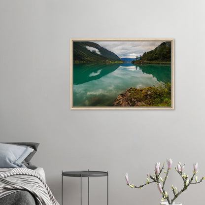 Tranquil Norwegian lake with mirrored hills in framed artwork