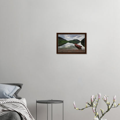 Crummock Water framed landscape with moody sky and calm water