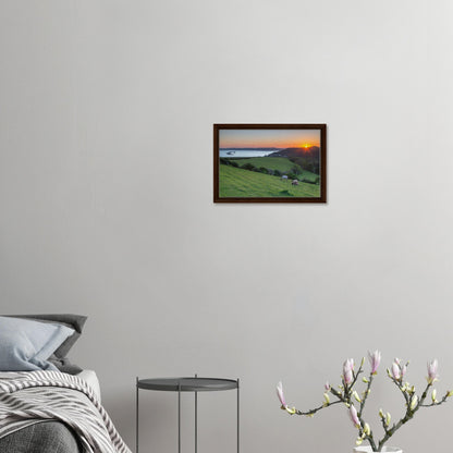 Framed wall art of grazing sheep and Devon coast