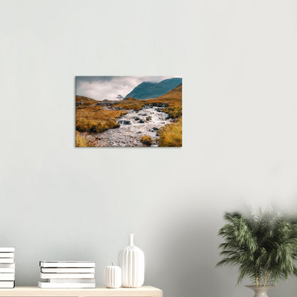 Atmospheric Highland canvas with water, rocks, and peaks