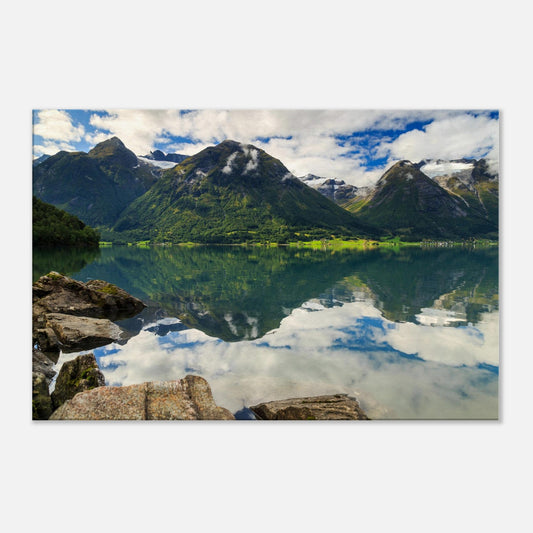 Majestic Norwegian lake scene with perfect mirror-like surface capturing lush green mountain slopes