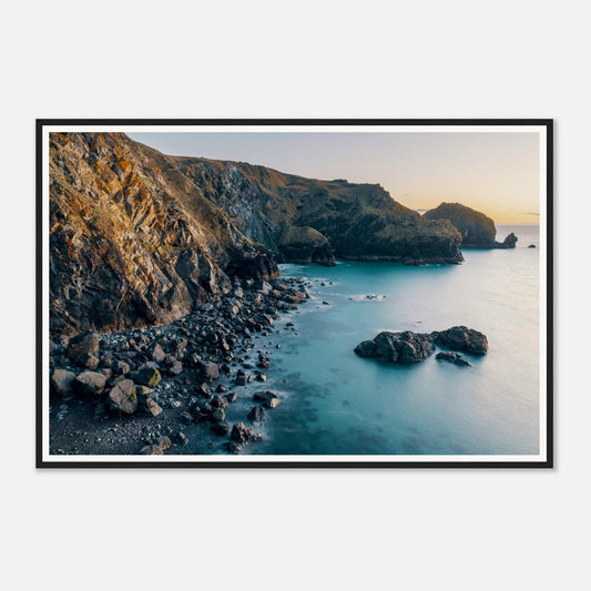Scenic framed wall art of Mullion Cove in golden hour light