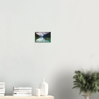 Mist-covered mountains over calm emerald lake in Norway, printed on canvas.