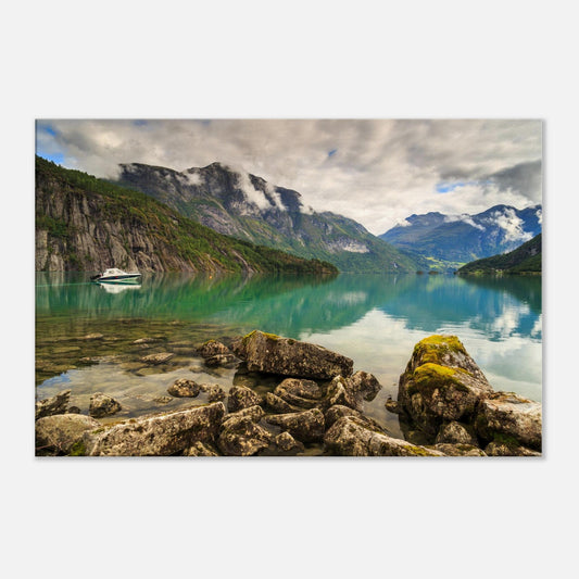 Tranquil Norwegian lake scene featuring a lone boat floating peacefully on calm, glassy water