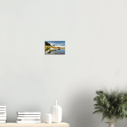 Canvas print of Panoramabahn showing alpine serenity with a bench beside a pond and clouds moving through distant mountain valleys.