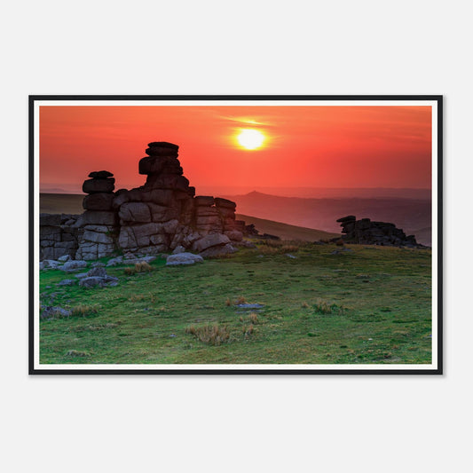 Fiery sunset sky silhouetting granite outcrops at Great Staple Tor