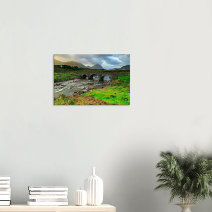 Canvas artwork of ancient bridge in Sligachan, Isle of Skye, with the Cuillin mountains looming beyond.