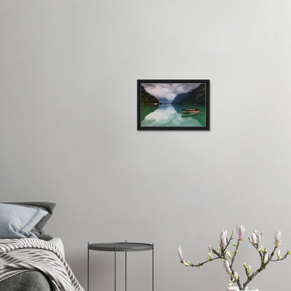 Peaceful Norwegian lake view with dramatic misty cliffs