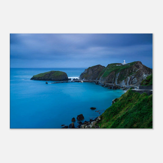 Canvas showcasing Lundy Island’s tranquil Landing Bay at twilight, highlighting the lighthouse and the calm, reflective sea.
